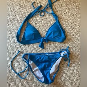 Small blue Victoria’s Secret bikini. Lightly worn. But good as new.